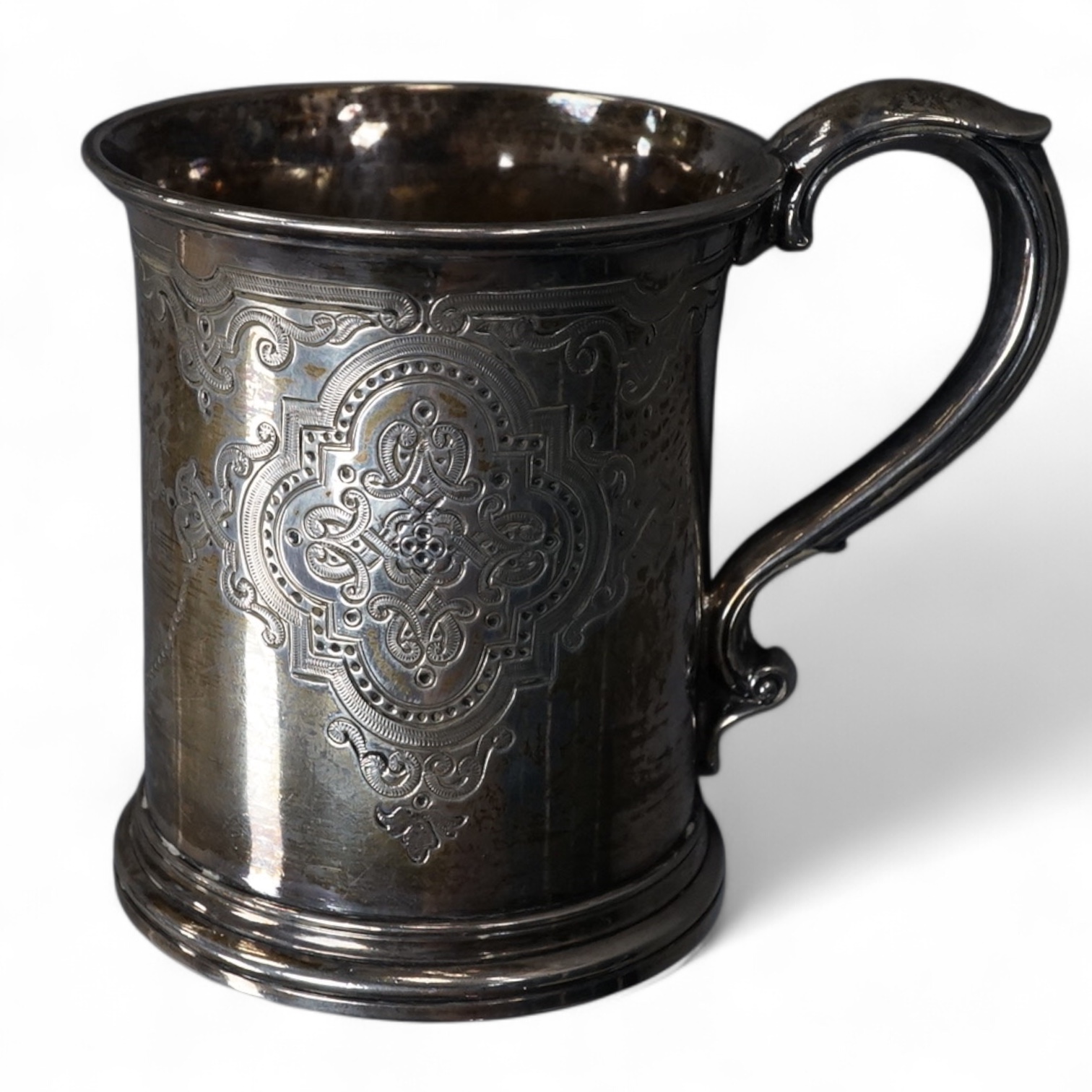 A Victorian engraved silver christening mug, Edward Ker Reid, London, 1871, height 85mm, 133 grams.
